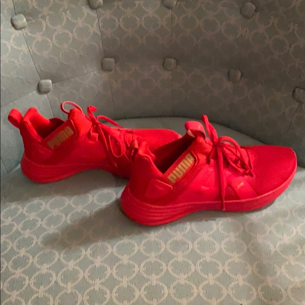 Red soft foam Pumas.